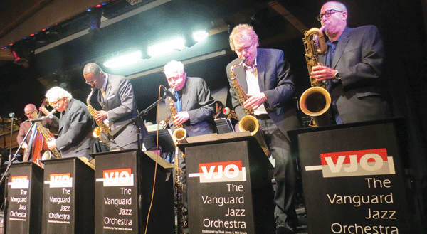 The Vanguard Orchestra (sax section, seen here) appears every Mon. at the Village Vanguard.  Photo by Jim Eigo